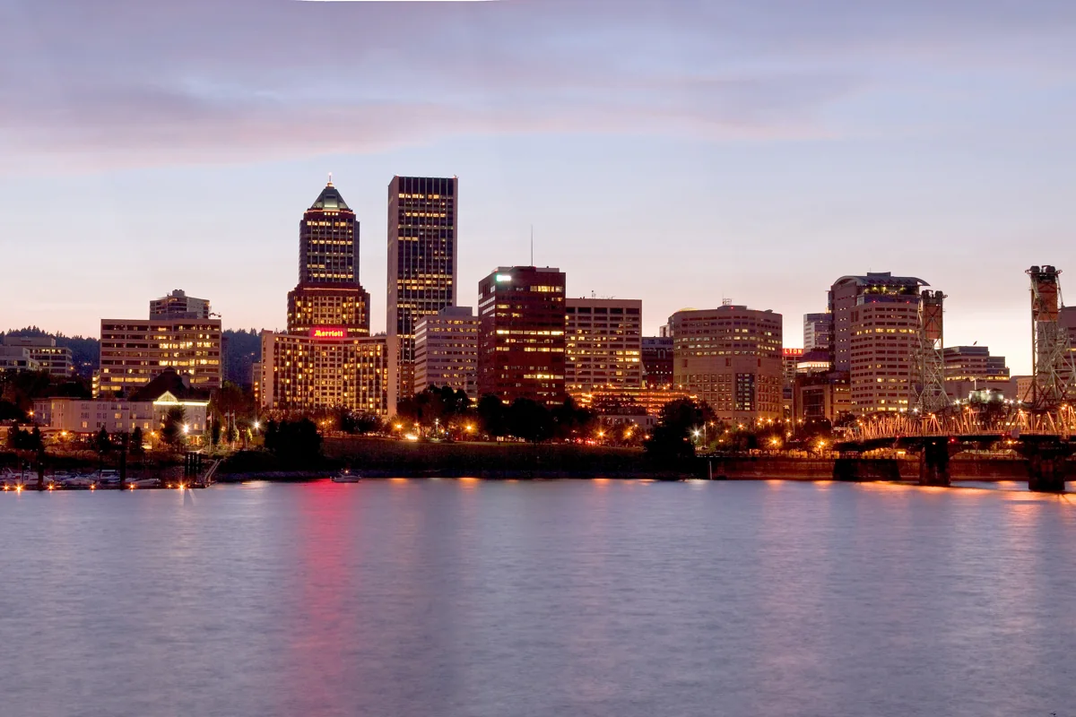Portland skyline reflected in the Willamette River at dusk